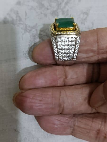 Top quality emerald in a heavy hand made crafted ring. Lab certified 3