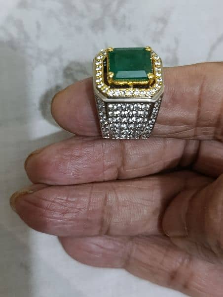 Top quality emerald in a heavy hand made crafted ring. Lab certified 4
