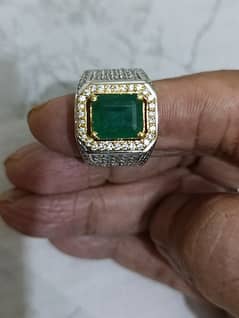 Top quality emerald in a heavy hand made crafted ring. Lab certified