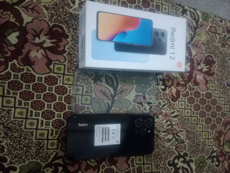 Redmi 12 8/128 only 15 days used 11.5 month warranty remaing 1