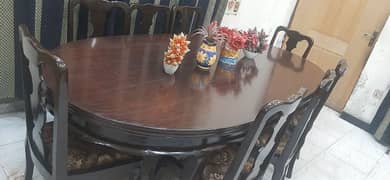 heavy wooden dinning with 8solid chairs excellent condition like new