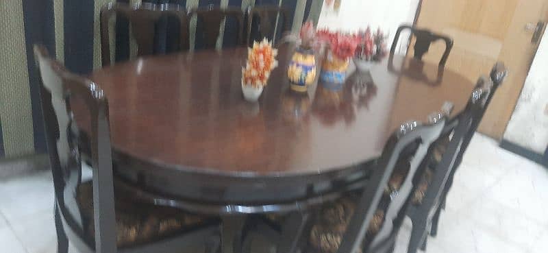 heavy wooden dinning with 8solid chairs excellent condition like new 4