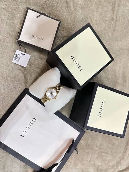 Luxury Gucci (G-Timeless) Watch with original box and packaging 10