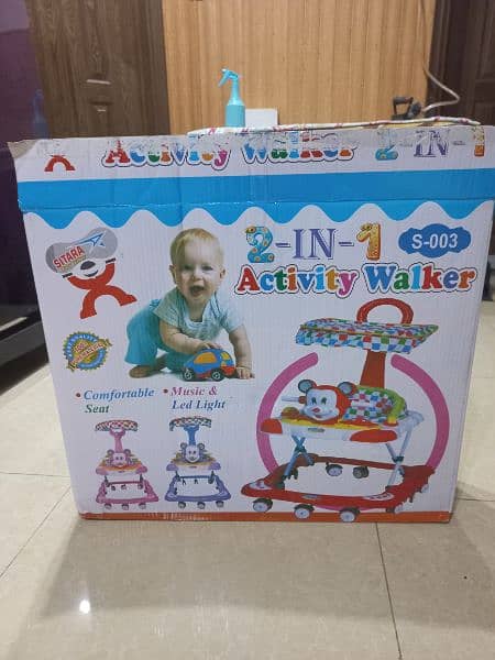 Baby Walker. . . New 5