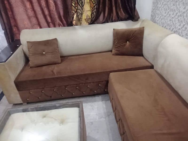 l shaped sofa,couch ,center table , 10/ 9 condition . 1