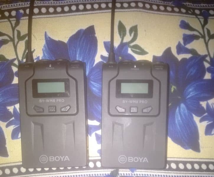Two Boya transmitter devices_model WM8 pro 5