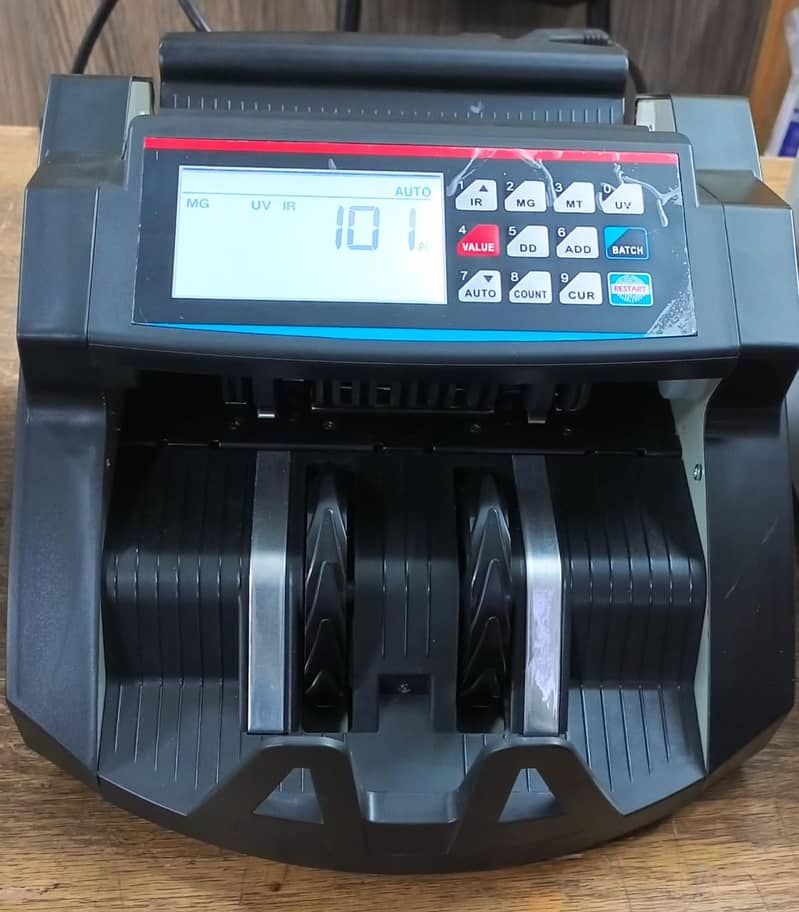 cash counting machine with fake note detection in pakistan 1