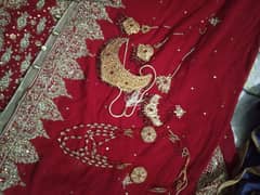 bridal lehanga 1 time used with jewellary lehnga colour is res 0