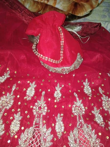 bridal lehanga 1 time used with jewellary lehnga colour is res 5