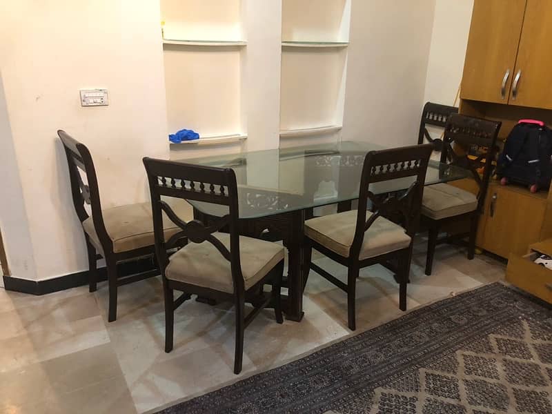 a beautiful chinoti dinning table with 6 chairs for sale 0