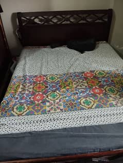 Double bed with wardrobe