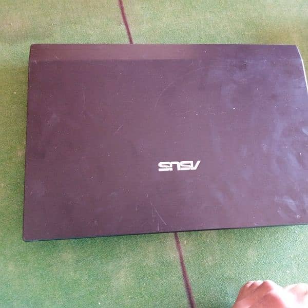 Asus new laptop 10 by 10 with charger lash condition 1