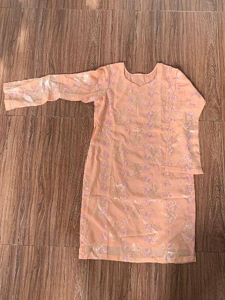 peach colour used shirt but in very good condition for sale 1