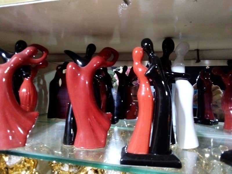 Red and black ceramic couple 1