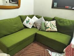 l shaped green sofa 0