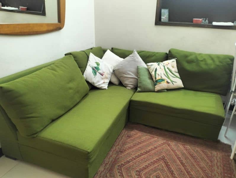 l shaped green sofa 2