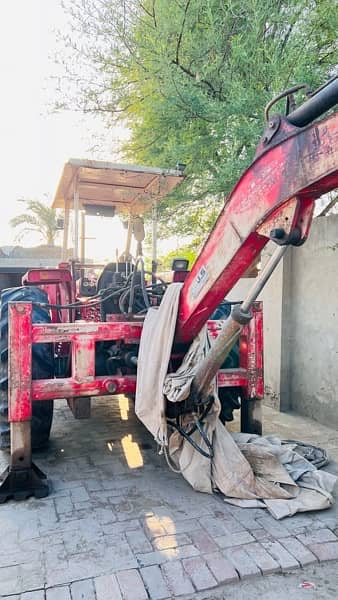 Millat tractor converted into byko excevator Machine 1