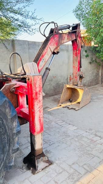 Millat tractor converted into byko excevator Machine 15