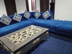 In this sofa there is two side tables and one big table show in pictur