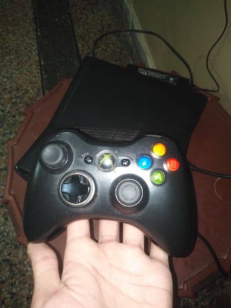 Xbox 360 slim 10 by 10 condition 15 plus games on original controller 3