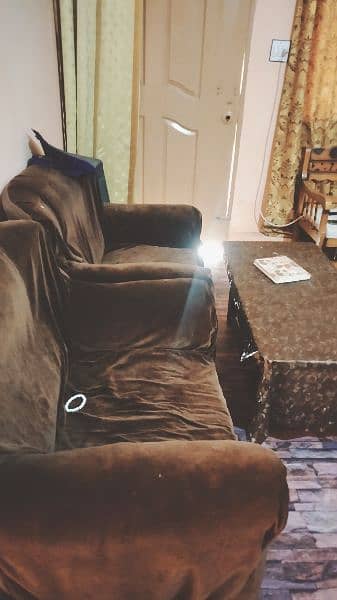 5 seater sofa set gently used in brown 4