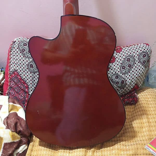 acoustic guitar with 1 siting pack  and 2 playing nobe 6