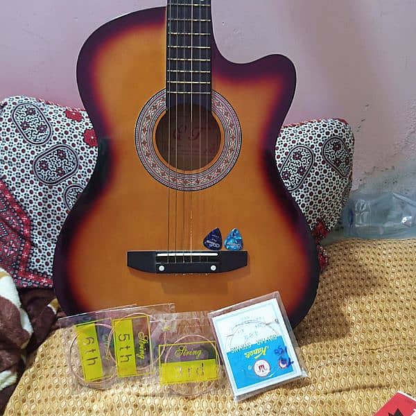 acoustic guitar with 1 siting pack  and 2 playing nobe 7