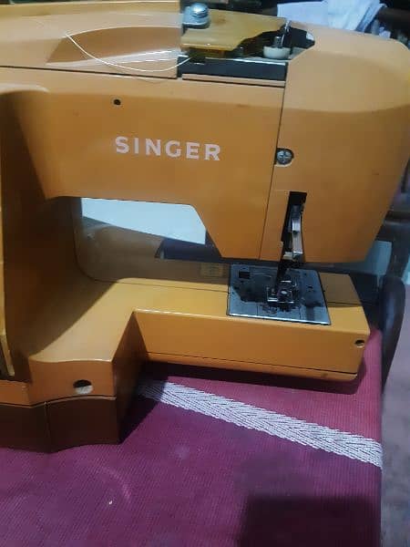singer sewing machine and embroidery or lots functions 0