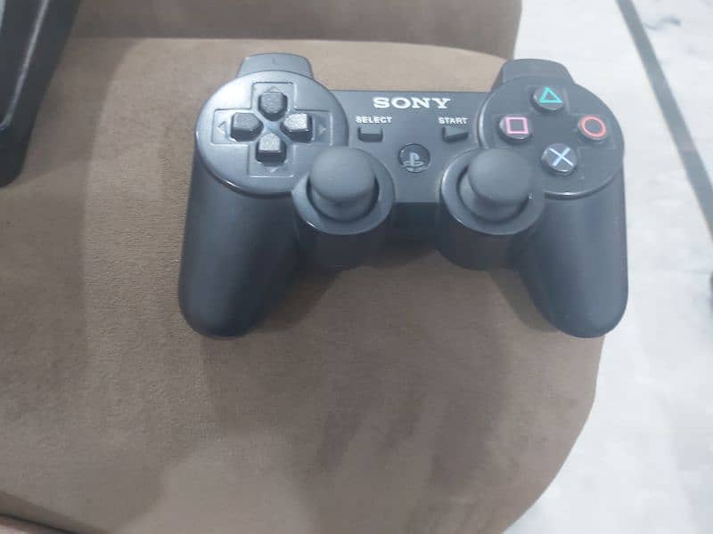 PS3 with controller 3