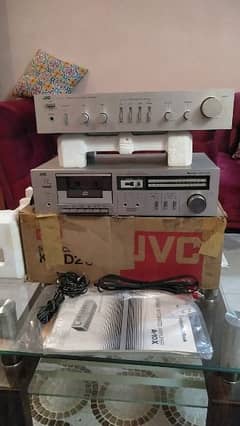 a beautiful old antique tape recorder and Amplifer 0