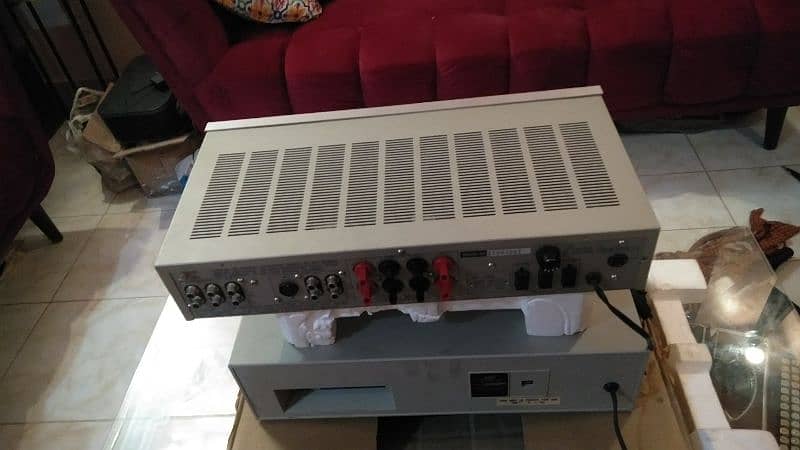 a beautiful old antique tape recorder and Amplifer 7