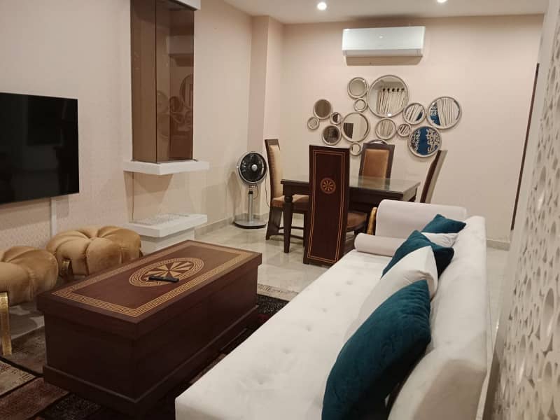 2 Beds Fully Furnished luxury apartment available FOR SALE in DHA Phase 8 Lahore. 1