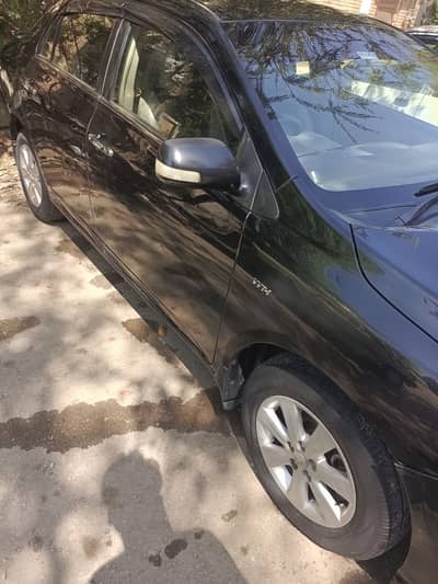 Toyota Carolla XLI 2010 Manual converted to GLI power Black color