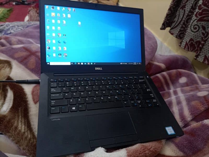 Dell laptop . You can see the details specifications in the pictures 1