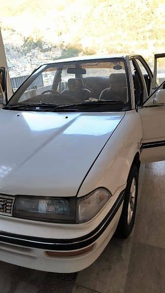 Toyota Corolla model 1987 to 1990 white color 2