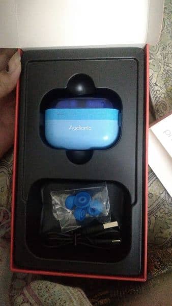 audionic 430 new ear  buds with warrenty only box open. 1