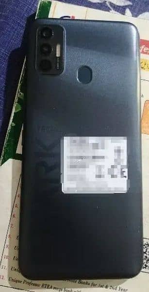Tecno spark 7 with box and charger . 0