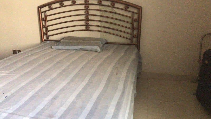 iron bed just like new with mattress 0