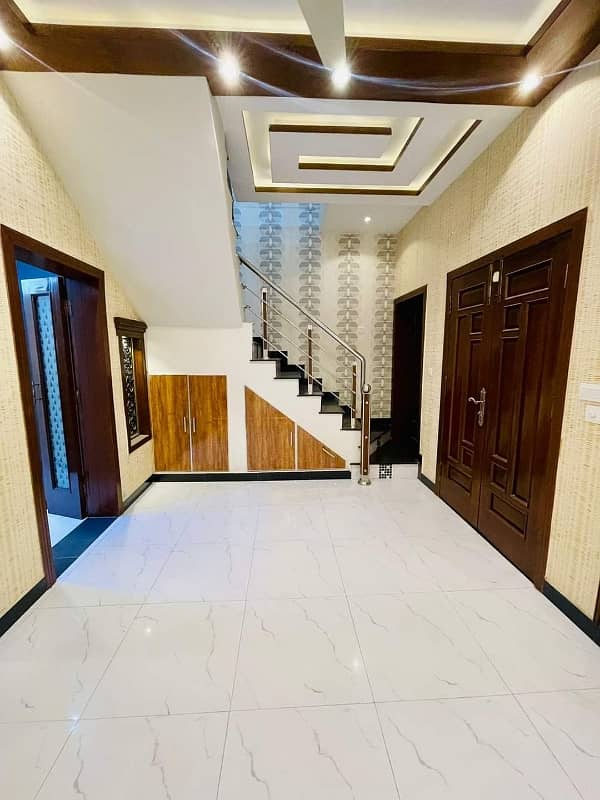 5 Marla brand new house for sale in AA block bahria Town Lahore good location A plus house visit anytime double story 1