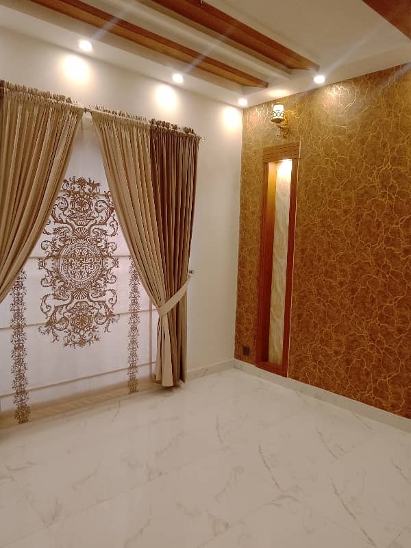 5 Marla house for sale in shershah block bahria Town Lahore brand new house good location A + house visit anytime pic available 10