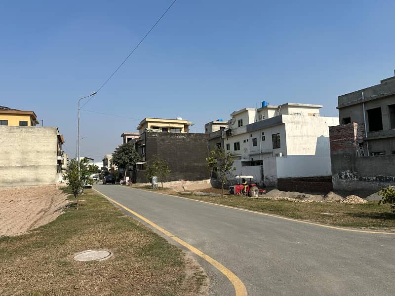 10 Marla Half Paid 85 Feet Road Plot For Sale in Diamond Block Park View City Lahore 0