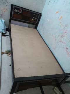 single wooden bed 0