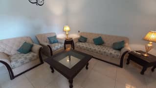 7 seater sofa + centre table set + fancy lambs + curtains for sale