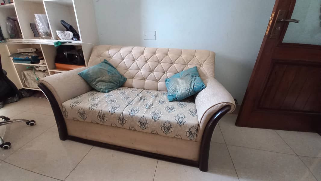 7 seater sofa + centre table set + fancy lambs + curtains for sale 1