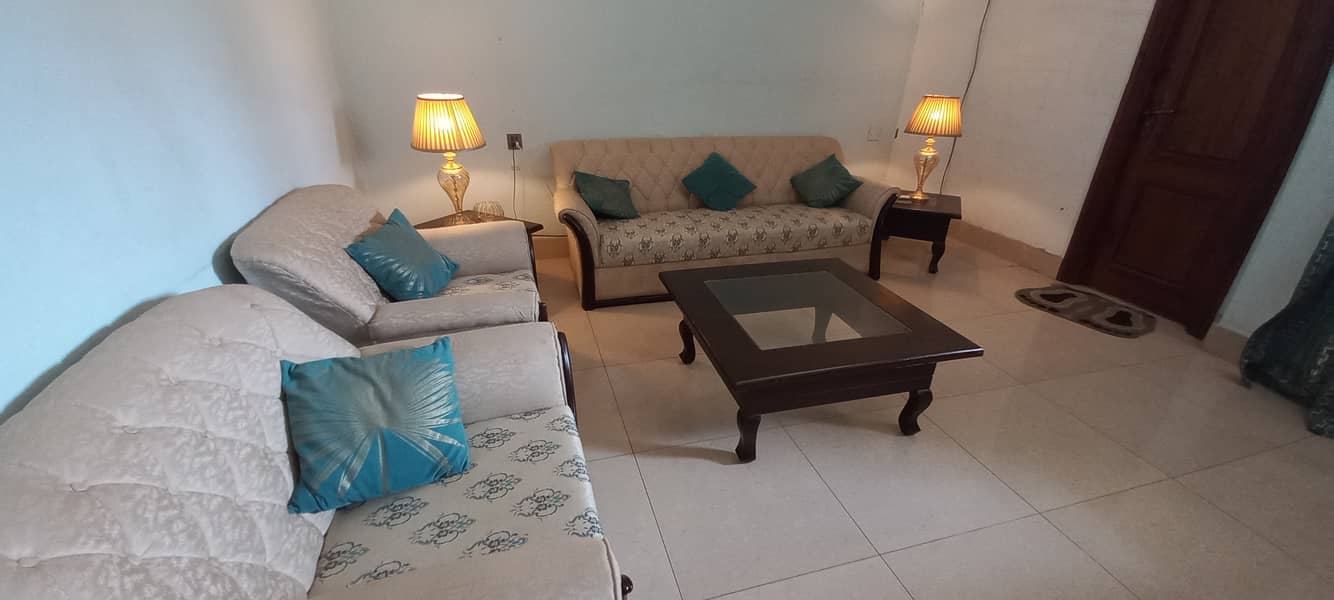 7 seater sofa + centre table set + fancy lambs + curtains for sale 3