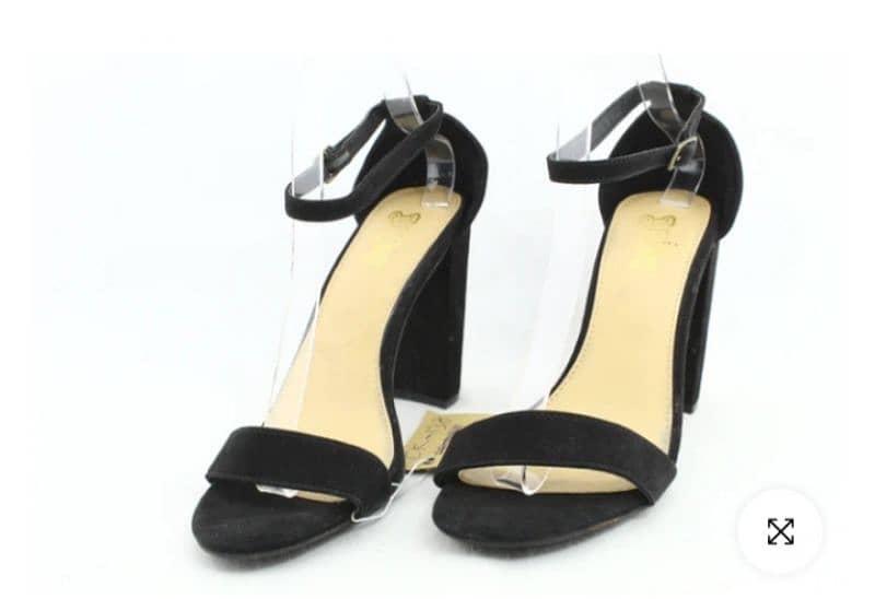 Black color high heel . 2