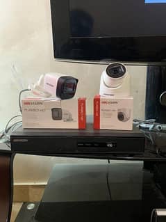Hikvision 4ch dvr with 2Cameras condition new 0