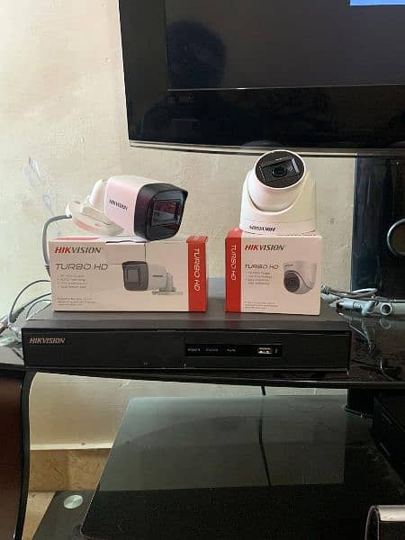 Hikvision 4ch dvr with 2Cameras condition new 2