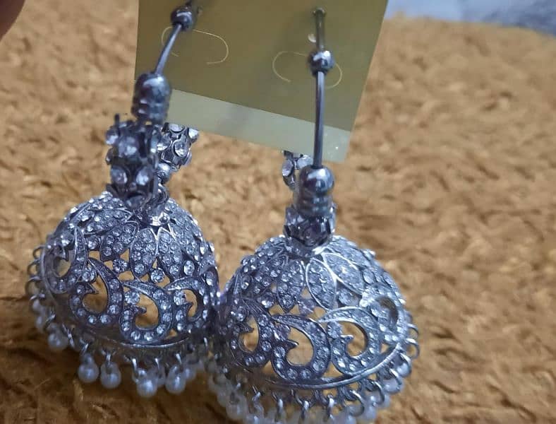 funcky earrings/ silver jhoomkas/ golden fancy earrings/ kundan ring 1