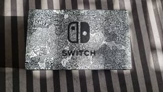 Nintendo Switch with Dbrand skin + 2 games + GC Controllers